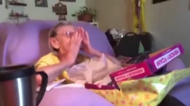 Look at how this lovely old lady reacts when she opens her birthday gift package