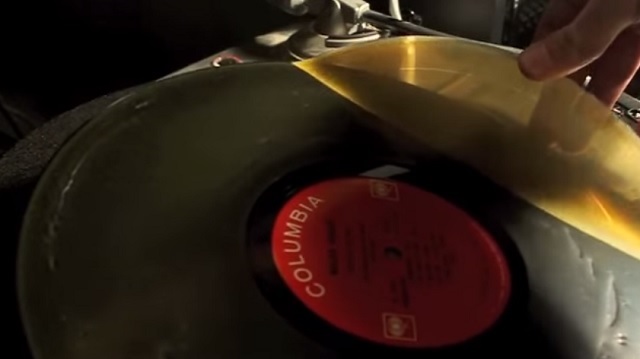 Spread some liquid glue onto your old LP's - here's why 