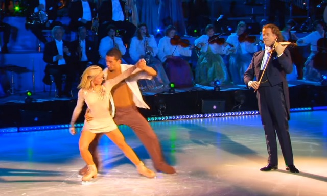 Andre Rieu interprets “My Heart Will Go On”, while two skaters give an enchanting performance