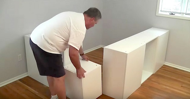 Several IKEA cupboards transformed into the most practical bed in the world