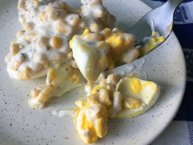 Eggs stuffed with corn salad