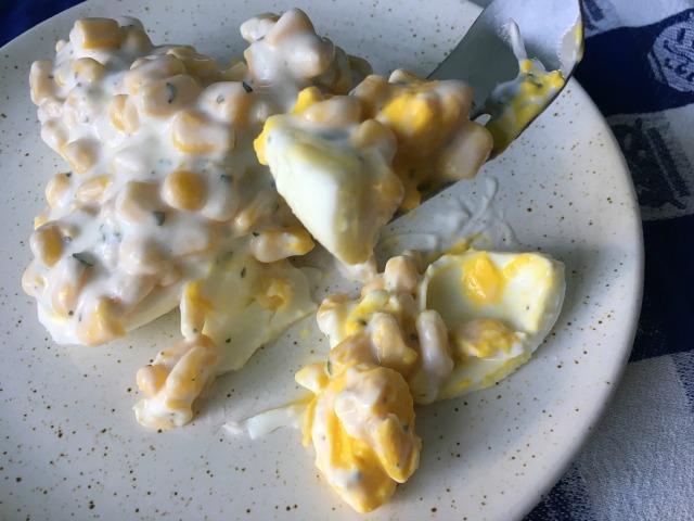 Eggs stuffed with corn salad