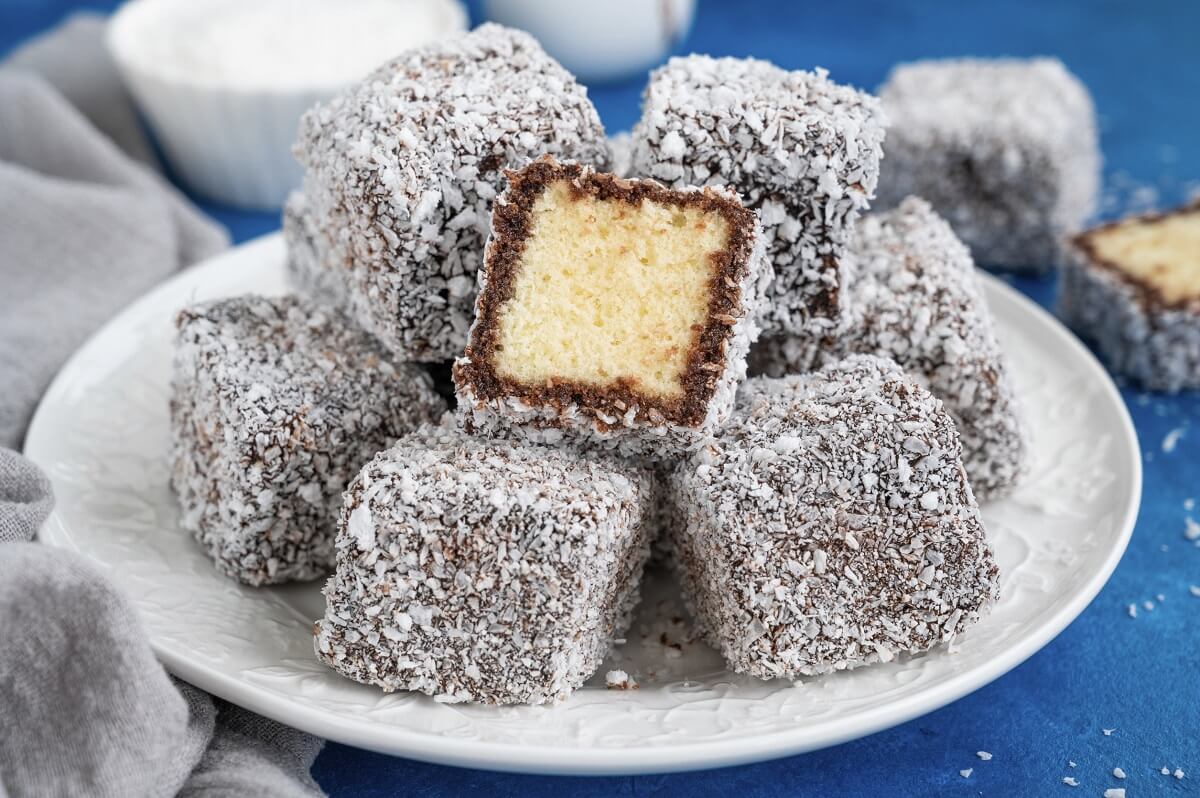 Lamington cake – a fragrant dessert rolled in chocolate and coconut