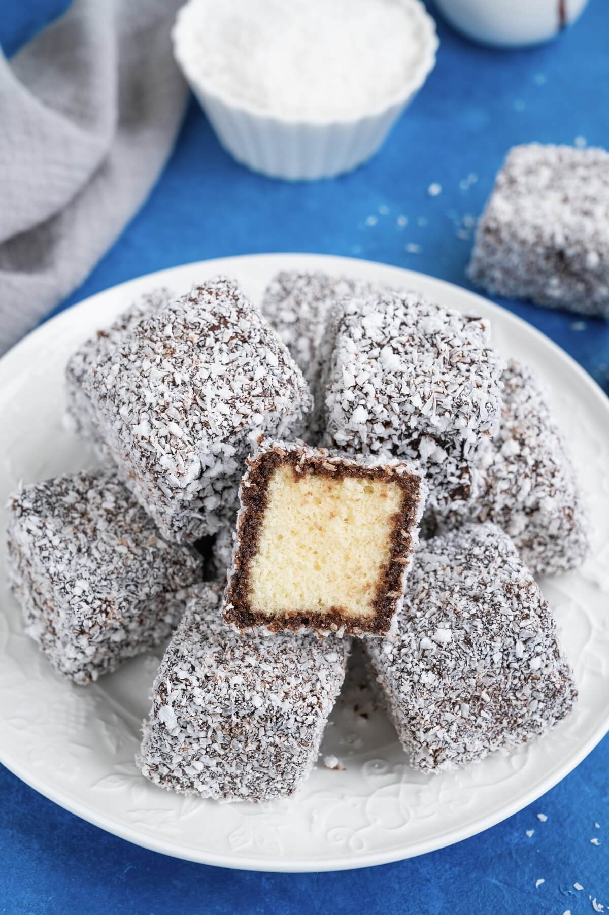 Lamington cake – a fragrant dessert rolled in chocolate and coconut